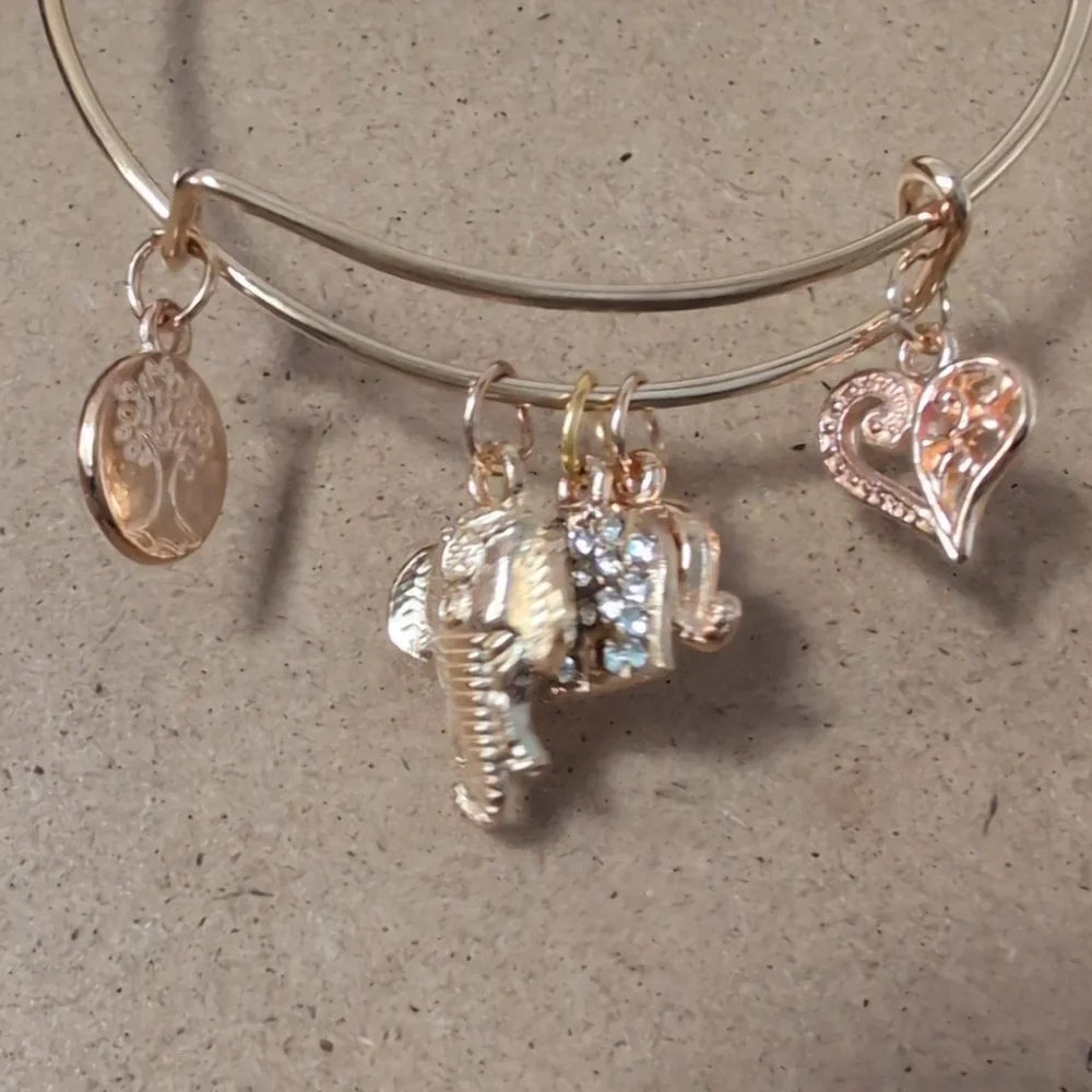 Gold Charm Bracelet with Elephant and Heart Accents